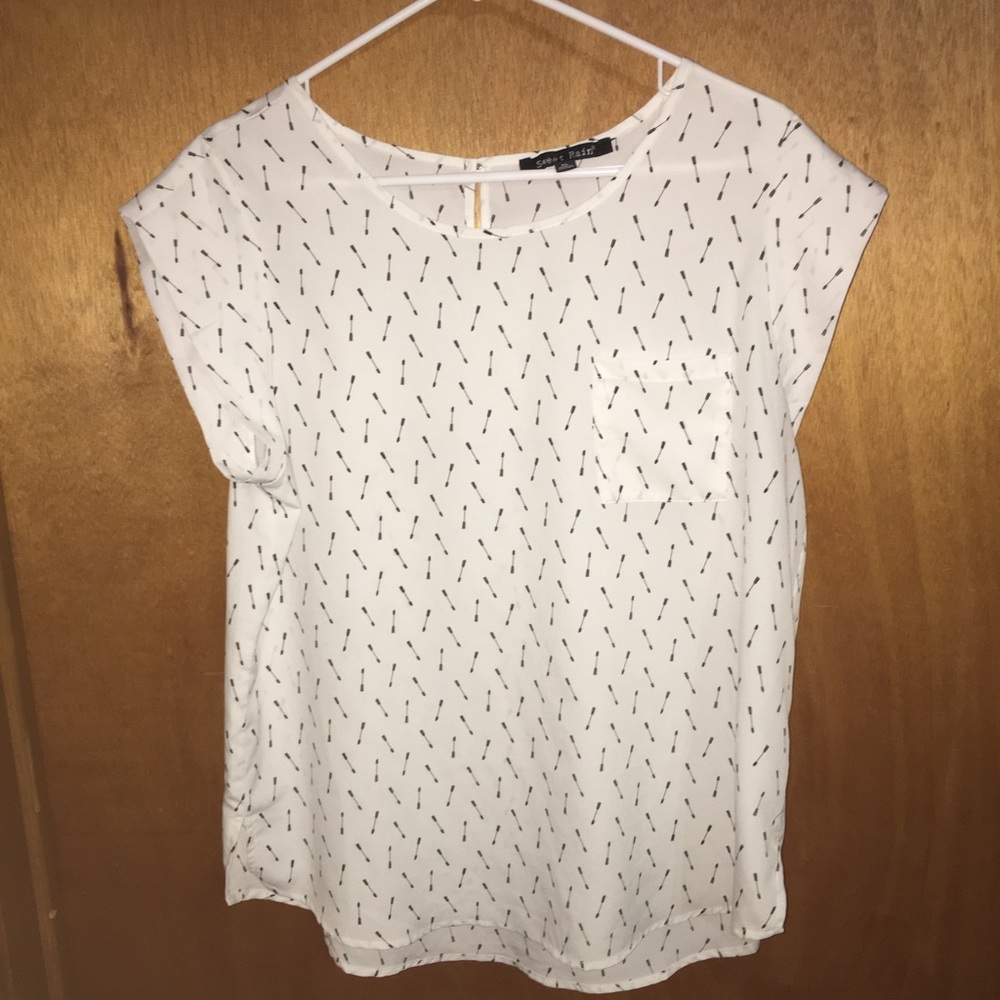 White blouse with black arrows